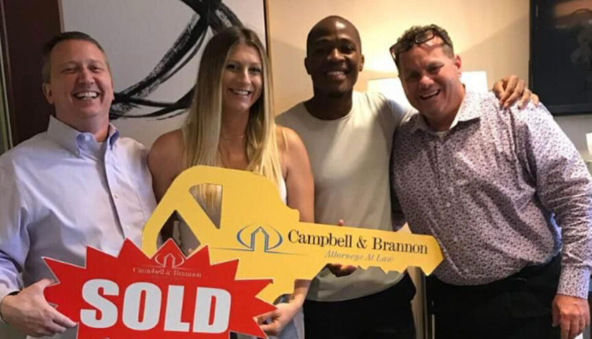 Realtor Richard Beeman and Rich Torrence with Felicia and Darlington Nagbe